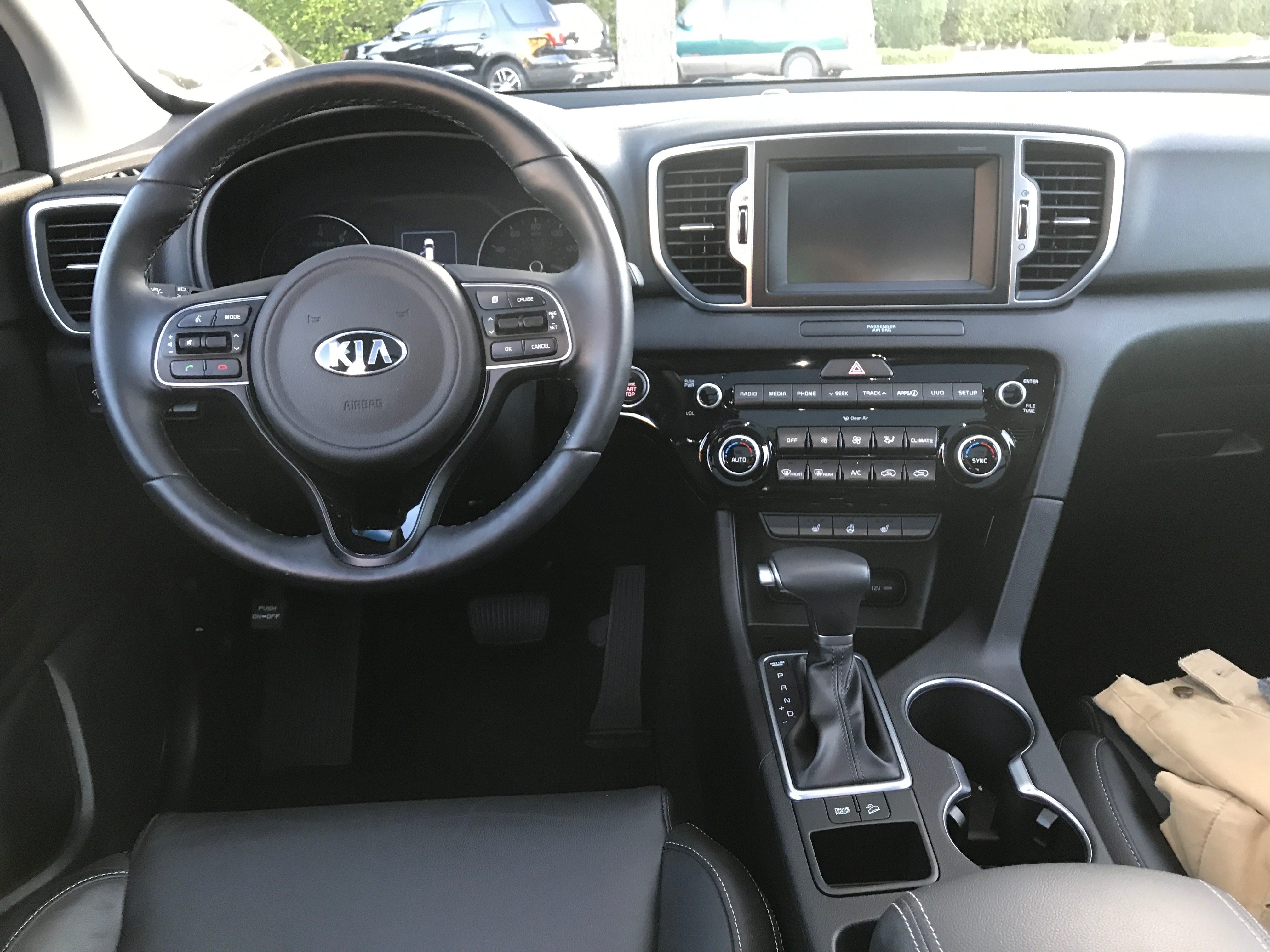 https://ocweekly.com/wp-content/uploads/2018/07/2018-Kia-Sportage-EX-FWD-steering-wheel-Coker.jpg?x60589